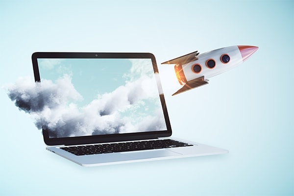 rocket coming out of laptop to symbolize a compelling website