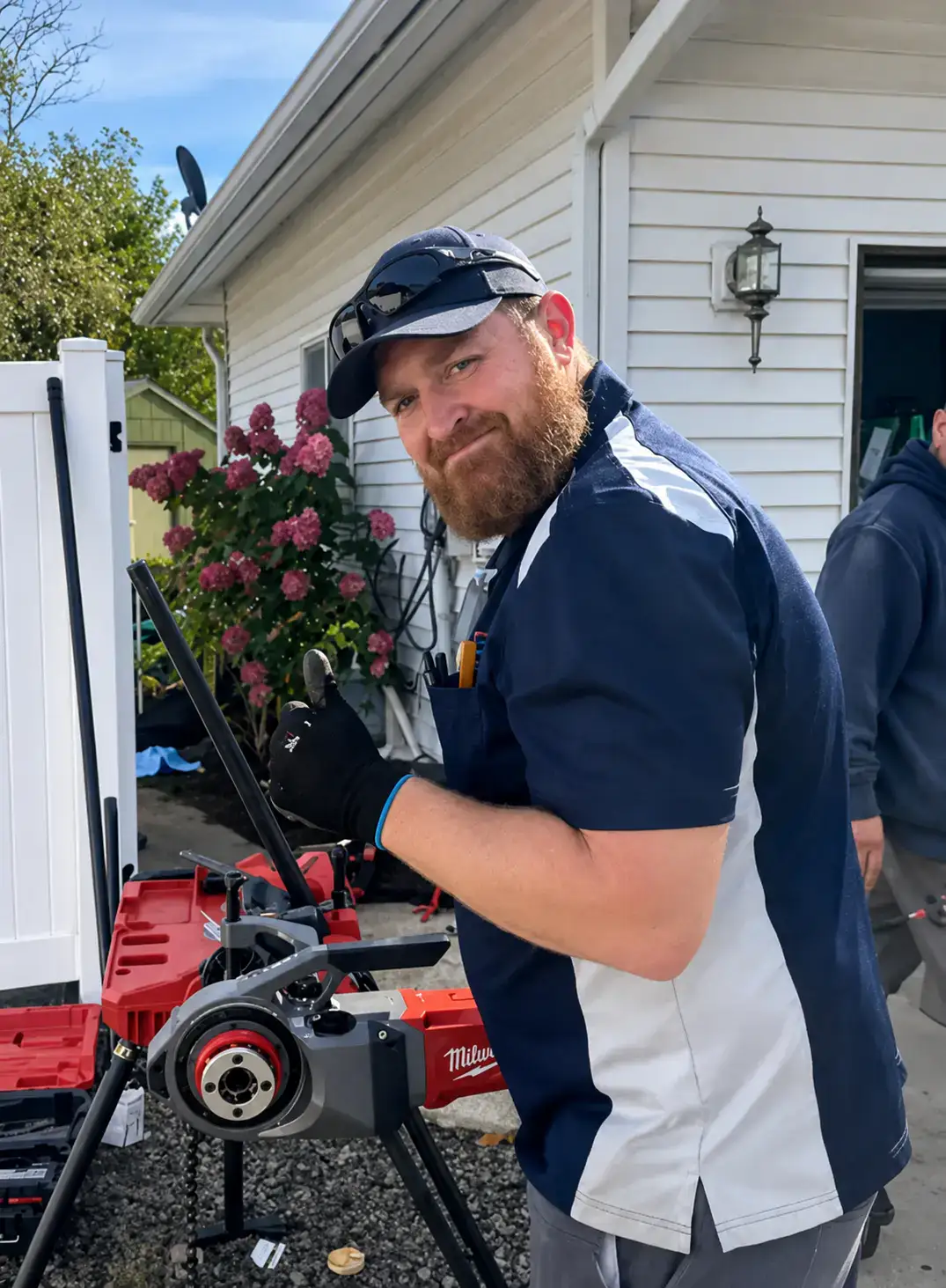 Comfort Heating and Air tech giving a thumbs up