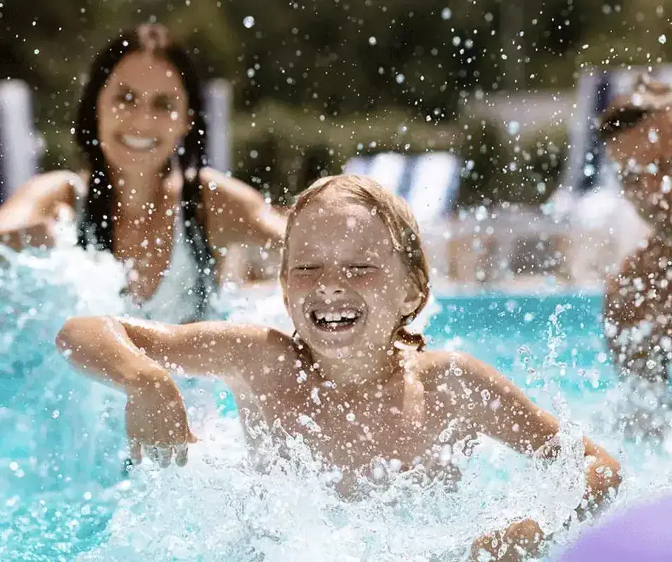 child playing in pool