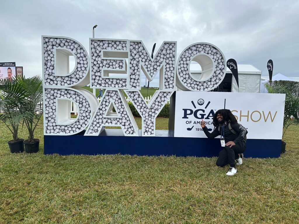 Hanging out in front of the PGA Show Demo Day sign. 
